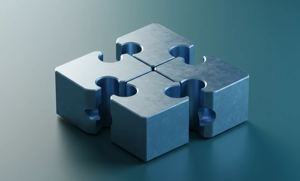 Metallene Puzzlestücke verbinden sich